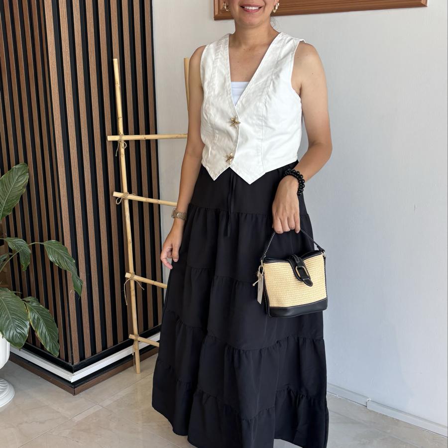 Yıldız düğmeli yelek ekru renktir